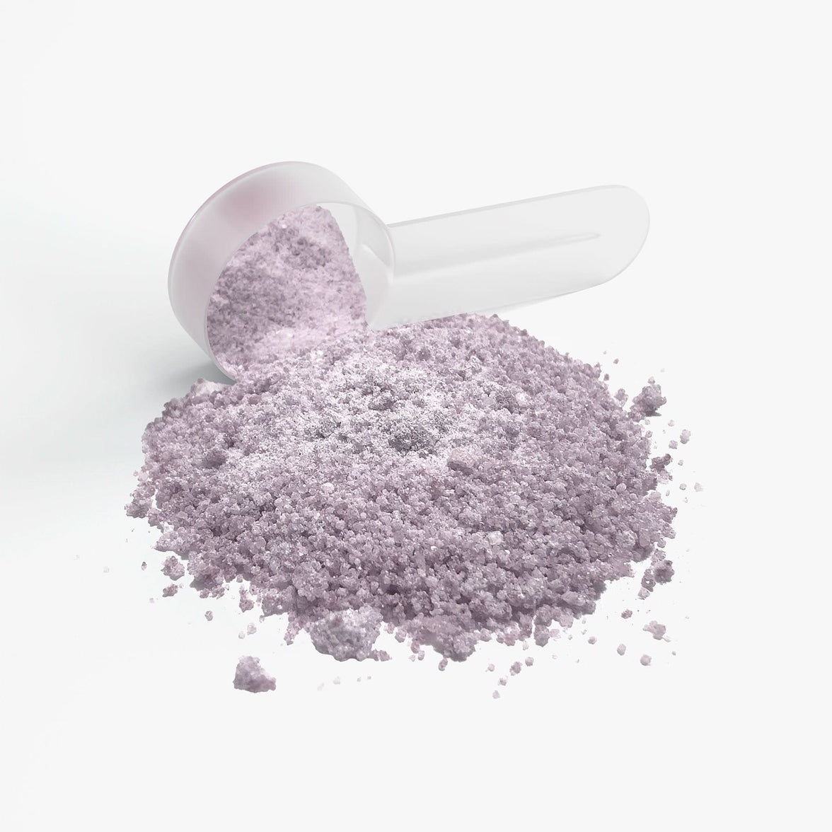 Scoop of fine purple powder with a small spill, showcasing Sour Grape Focus Powder for enhanced mental clarity and focus.