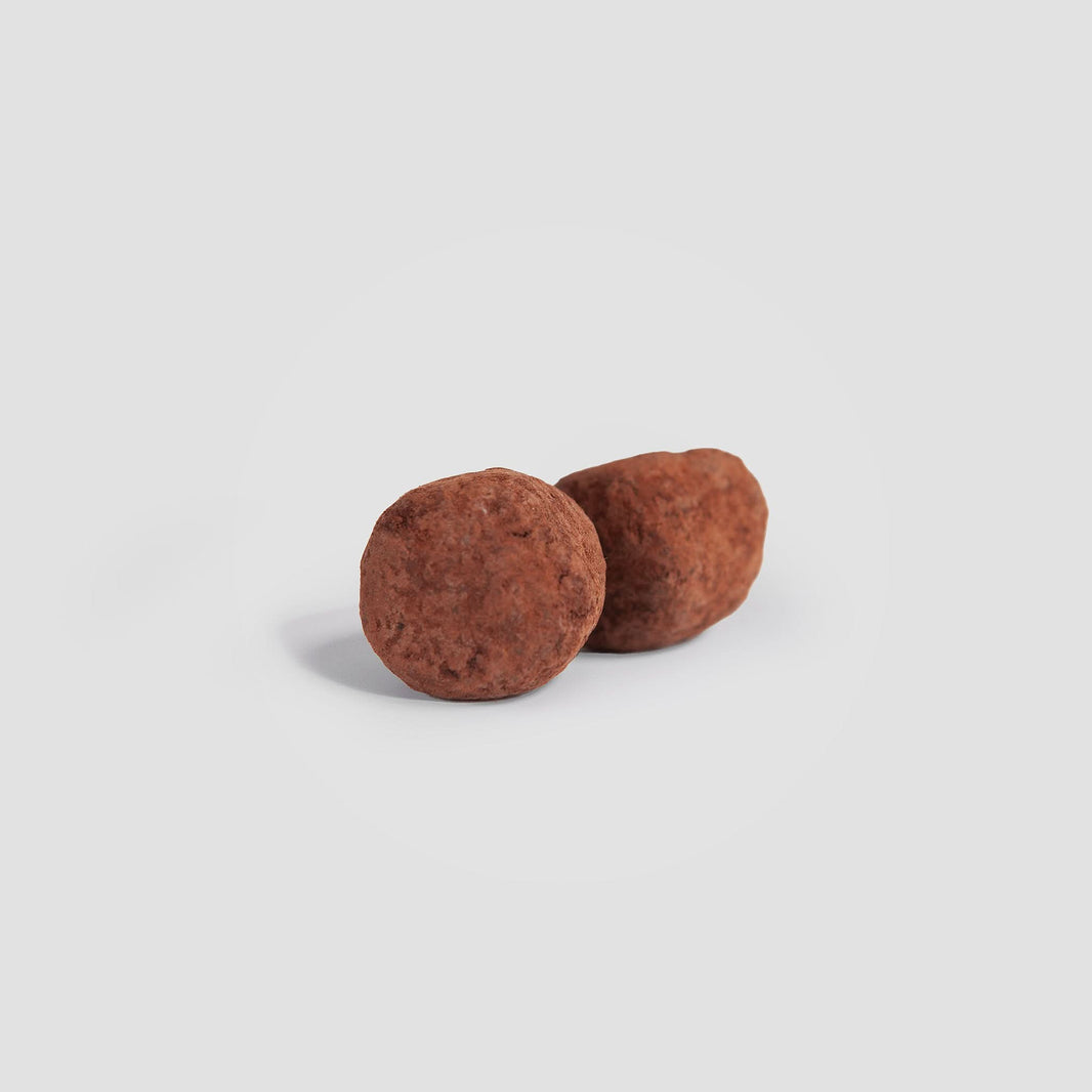 Vital Chaga Truffles offer a delicious way to support gut health and immunity. Made with wild Birch Chaga mushrooms and natural ingredients, these nutrient-dense chocolate truffles satisfy cravings while enhancing overall vitality. Enjoy daily for a month of wellness benefits, including immune-boosting antioxidants and essential minerals. Perfect for health-conscious chocolate lovers seeking effective support in a convenient treat.
