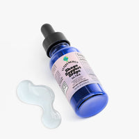 TeqenX Shape Support Drops in a blue glass dropper bottle, designed for metabolism and weight management support.