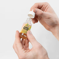 TeqGlow Dark Spot Therapy for sensitive skin features a dropper bottle, designed to hydrate and reduce dark spots gently. Formulated with adaptogenic mushrooms, chamomile, and calendula, this serum ensures effective results without harsh acids. Perfect for daily use, it balances moisture while promoting a clearer complexion. Transform your skin tone with TeqenX TeqGlow.