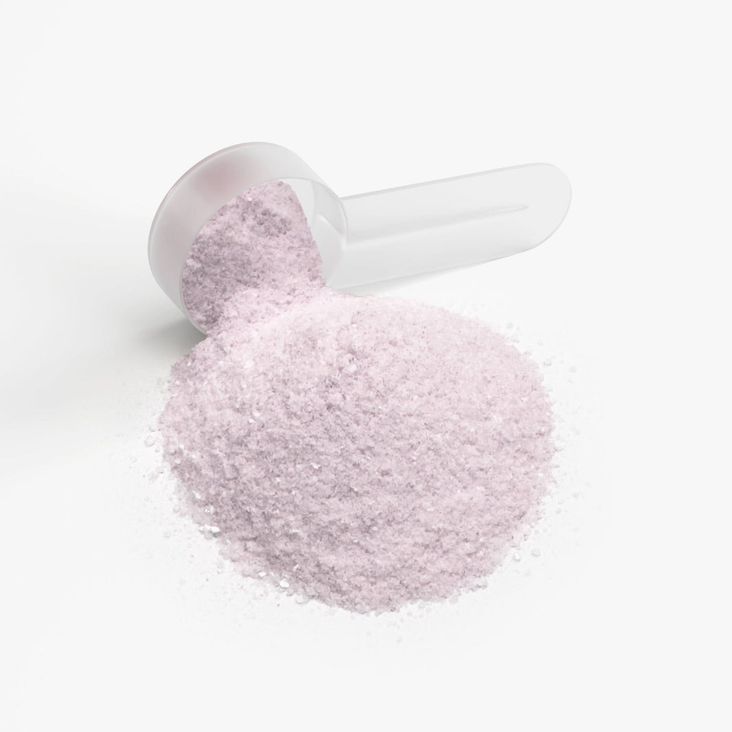 TeqenX ChargeUp Guava Berry energy powder in a scoop, promoting balanced energy and focus without crashes.