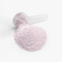 TeqenX ChargeUp Guava Berry energy powder in a scoop, promoting balanced energy and focus without crashes.