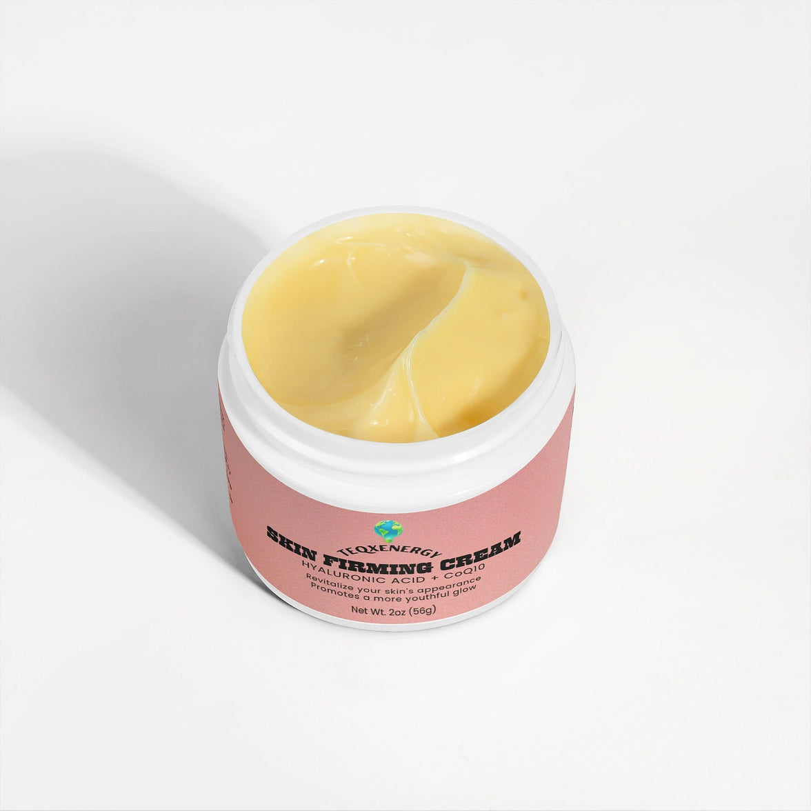 TeqenX Skin Firming Cream in a round container with a pink label, showcasing its creamy texture.