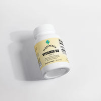 TeqenX Vitamin D3 2,000 IU softgels in a white bottle with a yellow label, supporting bone health and seasonal wellness.