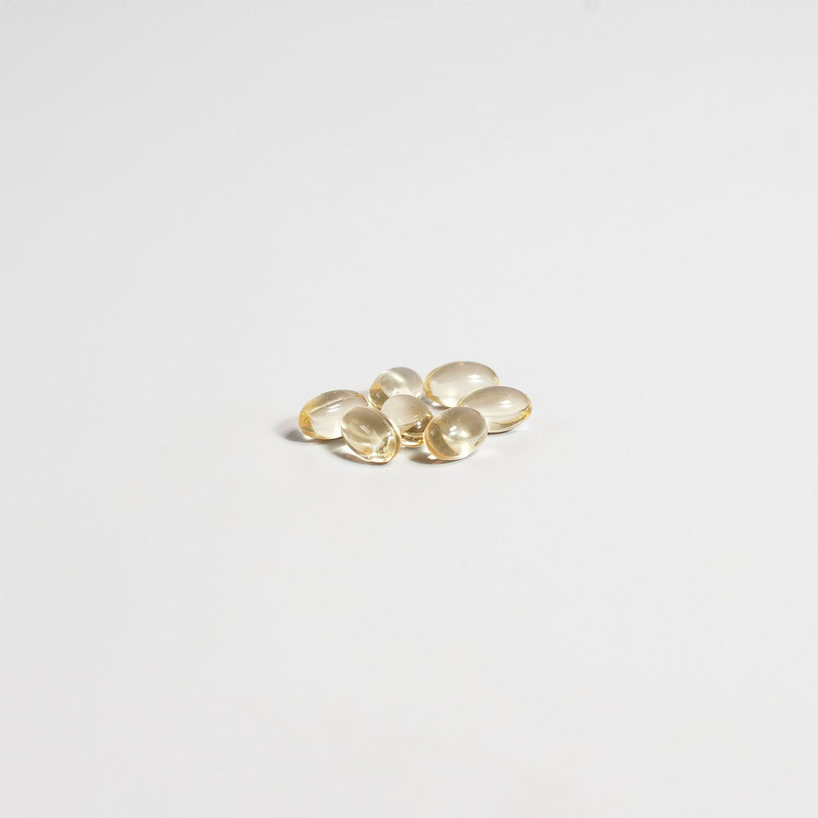 TeqenX Vitamin D3 2,000 IU softgels in a translucent oval shape, promoting bone health and seasonal wellness.