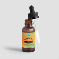 TeqenX Vitamin C Serum in a brown glass dropper bottle, designed for brightening and anti-aging benefits.