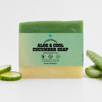 TeqenX Aloe & Cool Cucumber Soap features a two-tone bar with a green top and cream bottom, infused with cucumber slices. This 4oz luxury soap provides cooling relief for sensitive skin, combining hydrating aloe vera and fair trade oils for a soothing cleanse. Enjoy a refreshing cucumber scent while maintaining natural moisture. Perfect for those seeking ethical and luxurious skincare.